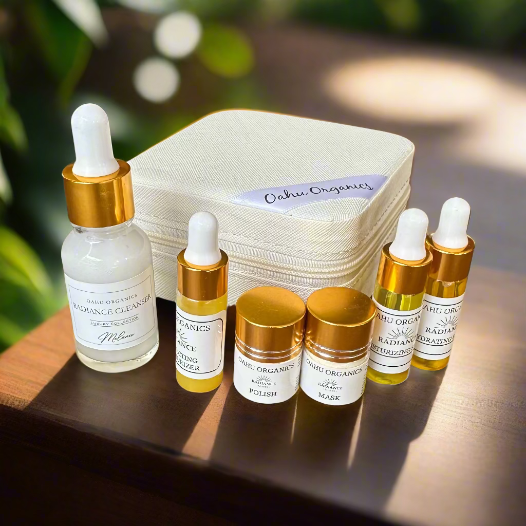 Set of skincare products including bottles and a pouch on a wooden surface
